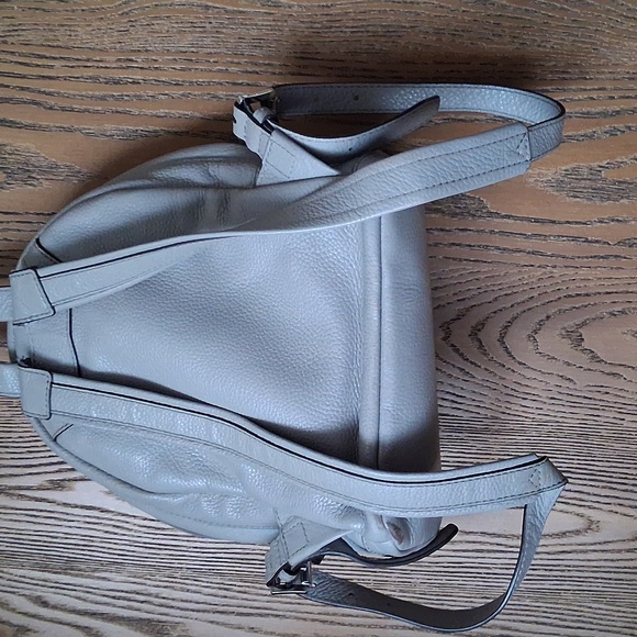 Stylish Gray Backpack with Silver Accents